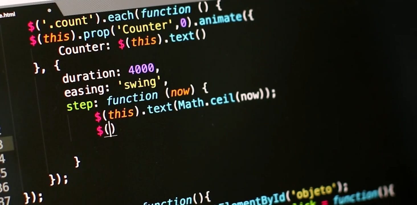 Colourful JavaScript code on computer screen