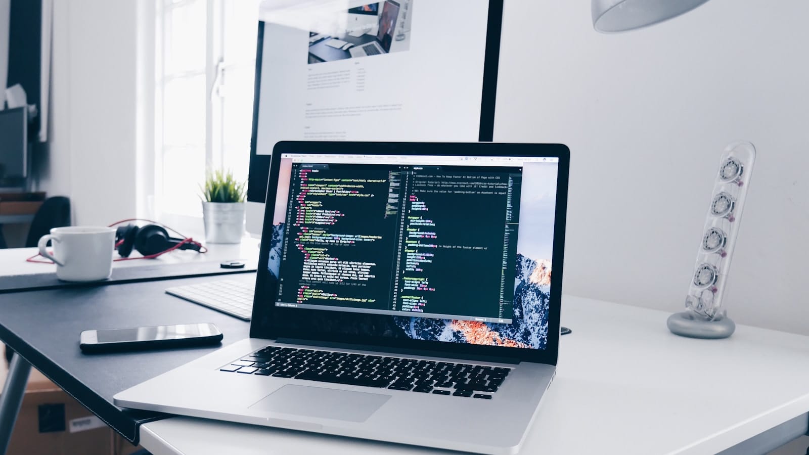 Website designer working on a laptop